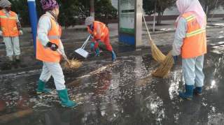 雨后忙清理 确保无积水